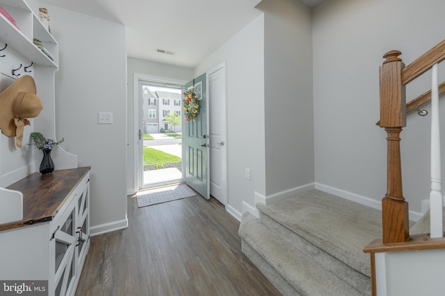 504 Sammy St, Woolwich Twp, NJ 08085 - foyer entrance featuring baseboards, stairs, dark wood-style floors, and visible vents