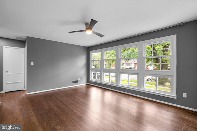 13316 Dauphine St, Silver Spring, MD 20906 - unfurnished room with ceiling fan, wood finished floors, and baseboards