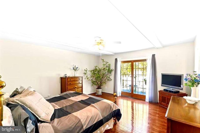 10728 Zion Dr, Fairfax, VA 22032 - bedroom with wood finished floors, beam ceiling, and access to exterior