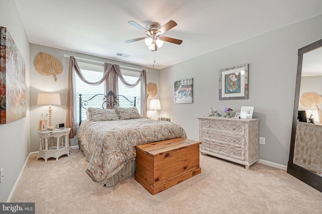 bedroom with baseboards, ceiling fan, carpet, and visible vents