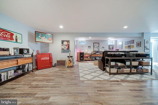 interior space with recessed lighting and wood finished floors