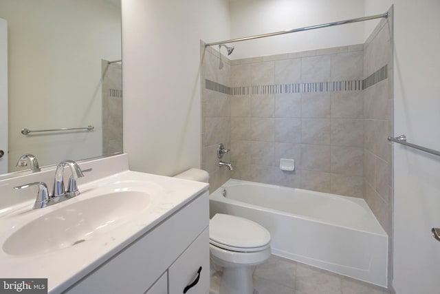 full bathroom featuring shower / bathtub combination, toilet, tile patterned floors, and vanity