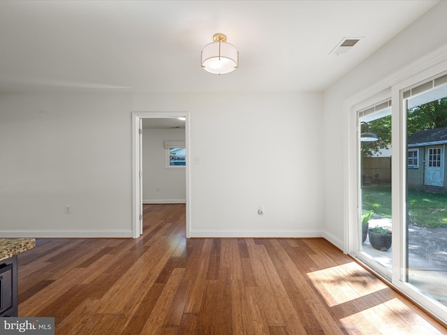 1904 N Amelia St, Sterling, VA 20164 - unfurnished dining area with wood finished floors and baseboards