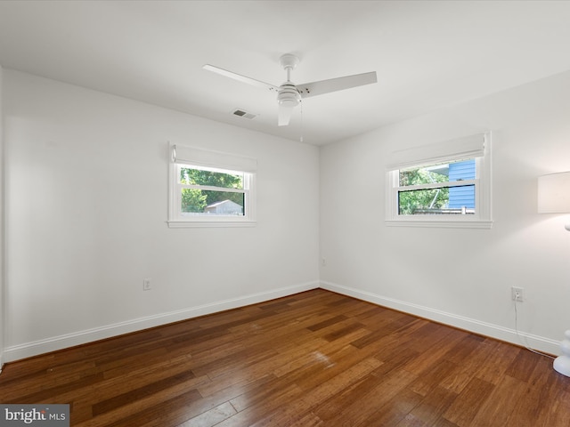 1904 N Amelia St, Sterling, VA 20164 - spare room featuring healthy amount of natural light, wood-type flooring, and baseboards