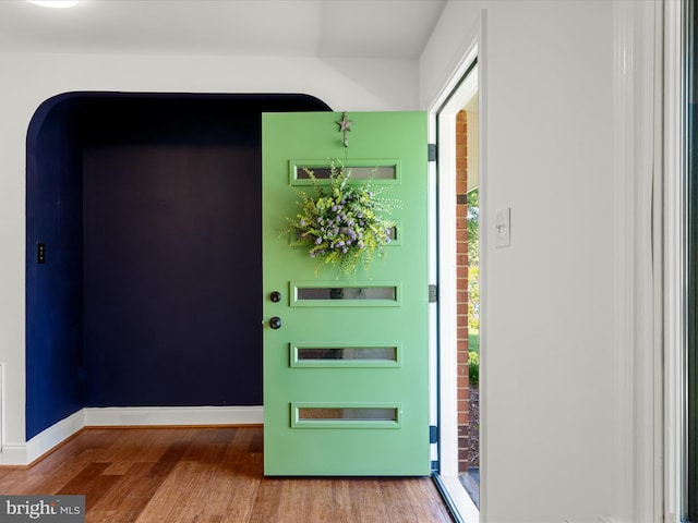1904 N Amelia St, Sterling, VA 20164 - entrance foyer featuring wood finished floors, healthy amount of natural light, and baseboards