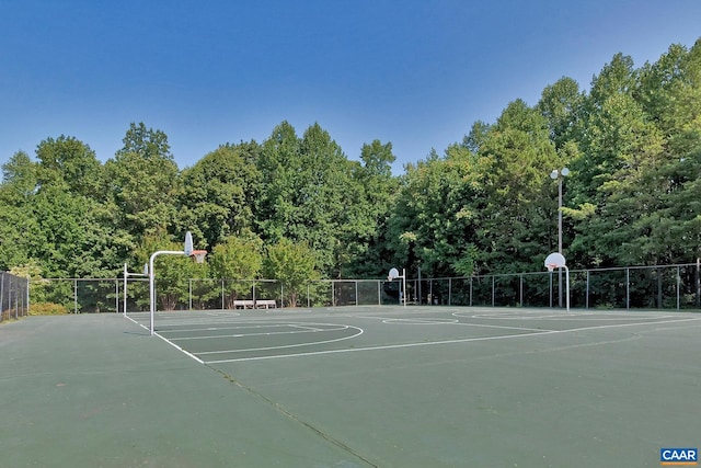 view of sport court featuring fence and community basketball court