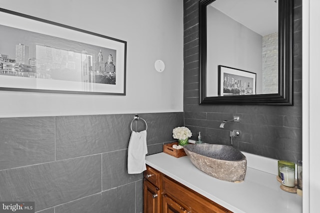 bathroom with vanity and backsplash