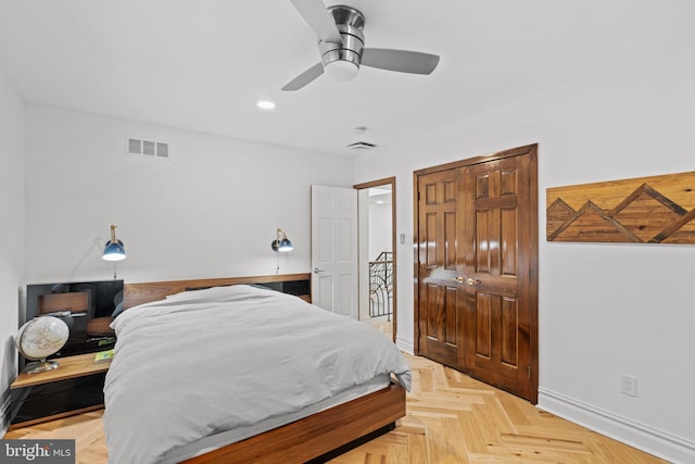 bedroom featuring a ceiling fan, visible vents, baseboards, a closet, and recessed lighting