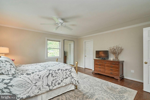 6368 Waterway Dr, Falls Church, VA 22044 - bedroom featuring crown molding, dark wood finished floors, baseboards, ceiling fan, and a closet