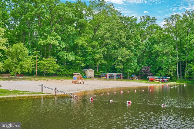 6368 Waterway Dr, Falls Church, VA 22044 - surrounding community with a storage unit, a water view, and an outdoor structure