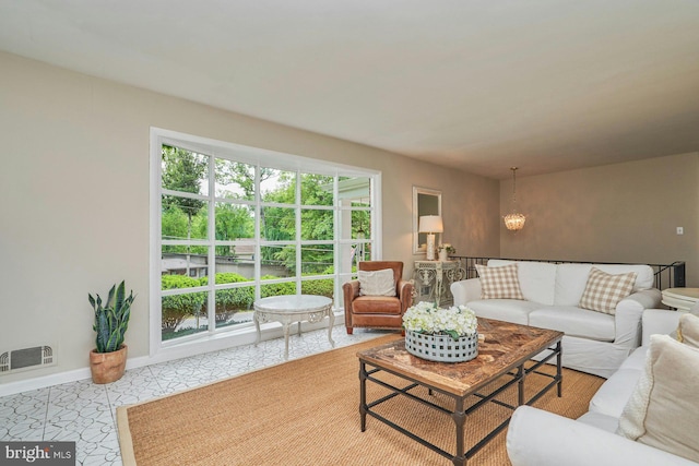 6368 Waterway Dr, Falls Church, VA 22044 - living room featuring a chandelier and baseboards