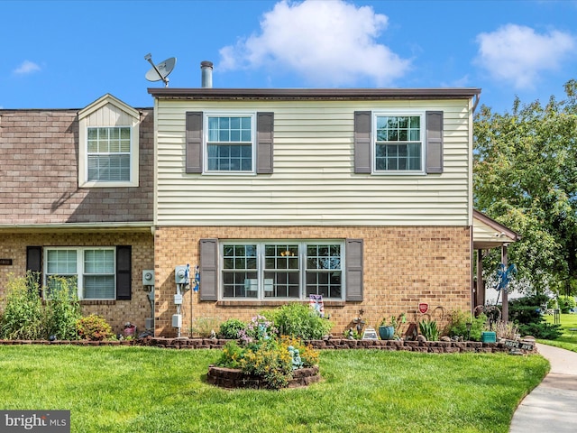 6832 Larkspur Sq, Frederick, MD 21703 - view of front facade with brick siding and a front lawn