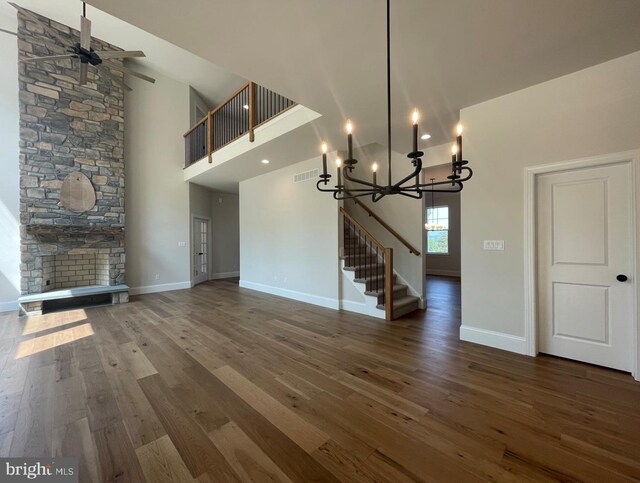 1605 Canary Rd, Quakertown, PA 18951 - unfurnished living room with stairway, baseboards, wood finished floors, and visible vents