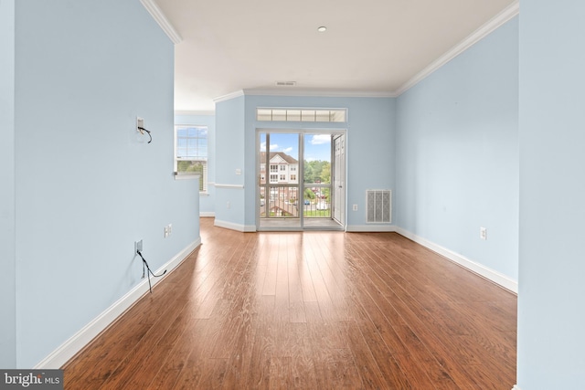 1604 Martha Ct Unit 404, Bel Air, MD 21015 - spare room with crown molding, hardwood / wood-style floors, and baseboards