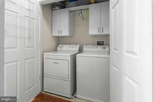 1604 Martha Ct Unit 404, Bel Air, MD 21015 - laundry area with cabinet space and separate washer and dryer