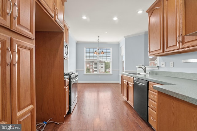 1604 Martha Ct Unit 404, Bel Air, MD 21015 - kitchen featuring stainless steel appliances, a sink, crown molding, recessed lighting, and dark wood-type flooring