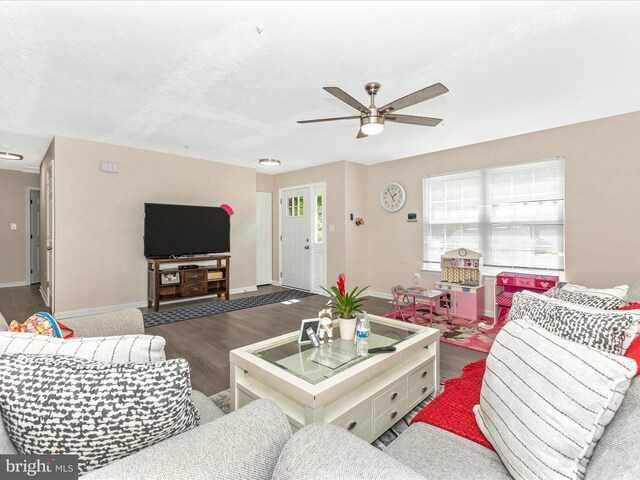 1710 Dennis Ct, District Heights, MD 20747 - living room with ceiling fan, baseboards, and wood finished floors