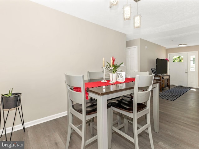 1710 Dennis Ct, District Heights, MD 20747 - dining space featuring baseboards and wood finished floors