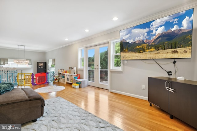 1612 Belvedere Blvd, Silver Spring, MD 20902 - living area featuring french doors, ornamental molding, wood finished floors, baseboards, and recessed lighting