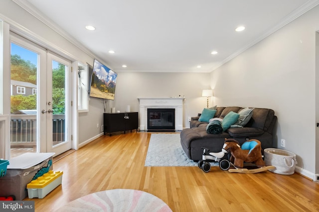 1612 Belvedere Blvd, Silver Spring, MD 20902 - living area with light wood-style floors, crown molding, baseboards, recessed lighting, and french doors
