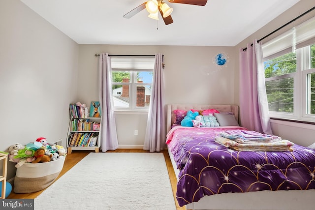 1612 Belvedere Blvd, Silver Spring, MD 20902 - bedroom with wood finished floors, a ceiling fan, and baseboards