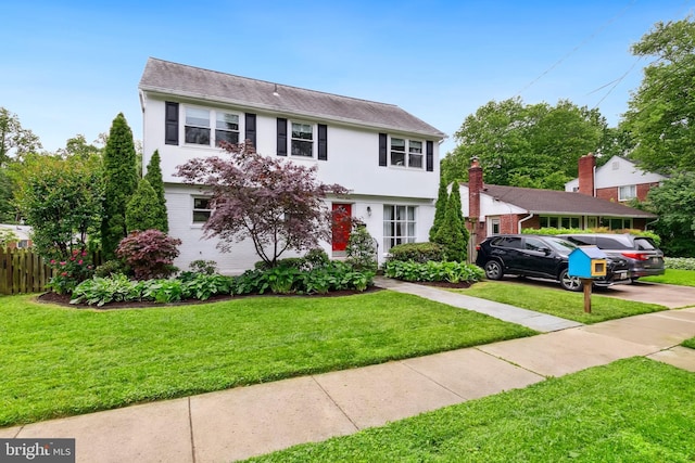 1612 Belvedere Blvd, Silver Spring, MD 20902 - colonial inspired home with stucco siding and concrete driveway