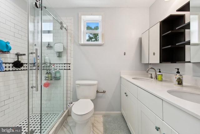 1612 Belvedere Blvd, Silver Spring, MD 20902 - bathroom with toilet, double vanity, a stall shower, and baseboards
