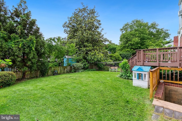 1612 Belvedere Blvd, Silver Spring, MD 20902 - view of yard with a deck and view of wooded area