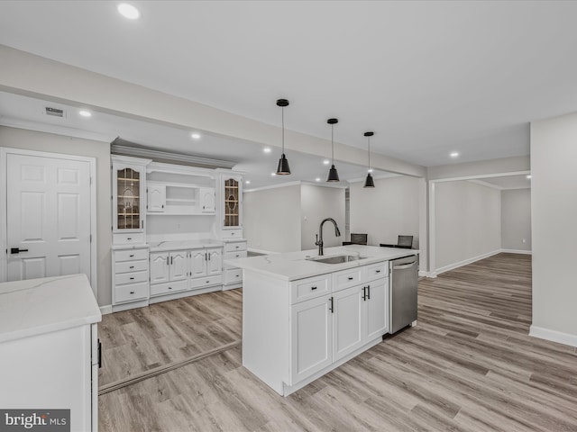 kitchen with recessed lighting, white cabinetry, a sink, and dishwasher
