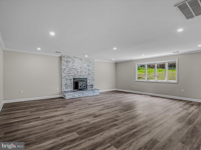 unfurnished living room with visible vents, ornamental molding, and recessed lighting