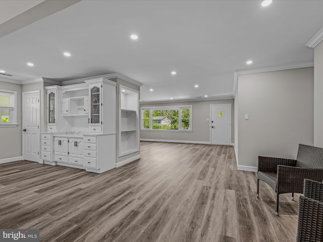kitchen with white cabinets, open shelves, recessed lighting, baseboards, and ornamental molding