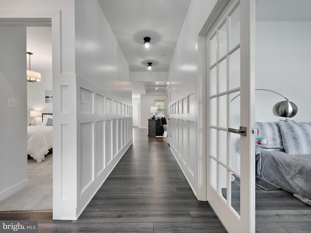 9929 Pesade Way, Upper Marlboro, MD 20772 - corridor with dark wood finished floors, french doors, and baseboards
