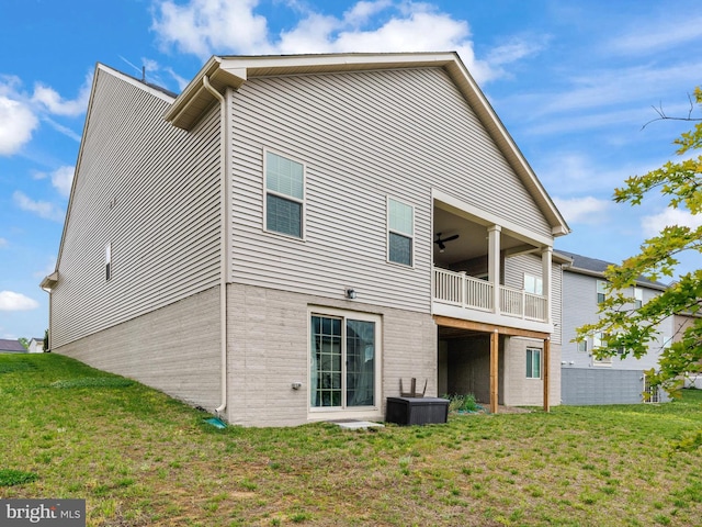 9929 Pesade Way, Upper Marlboro, MD 20772 - rear view of house with a lawn, a balcony, central AC unit, and a ceiling fan