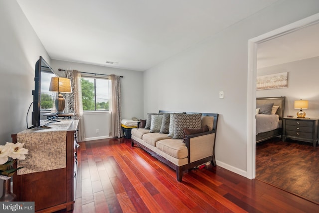 115 E Kings Hwy Unit # 104, Maple Shade, NJ 08052 - living room featuring dark wood-style flooring and baseboards
