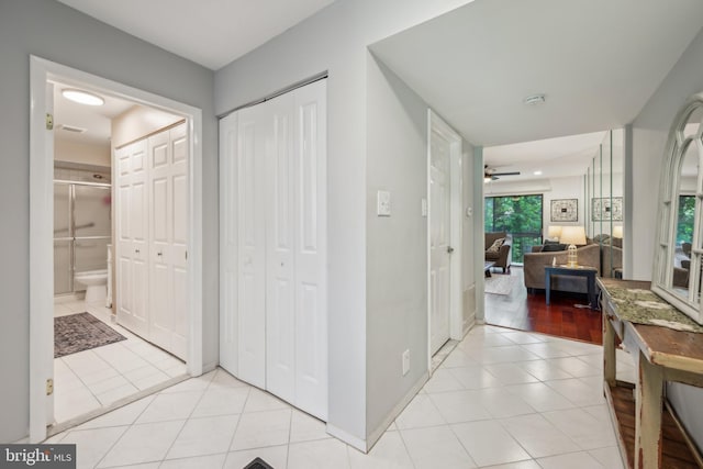 115 E Kings Hwy Unit # 104, Maple Shade, NJ 08052 - hall with light tile patterned flooring and baseboards