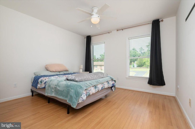 102 Haldane Dr, La Plata, MD 20646 - bedroom featuring light wood finished floors, baseboards, and a ceiling fan