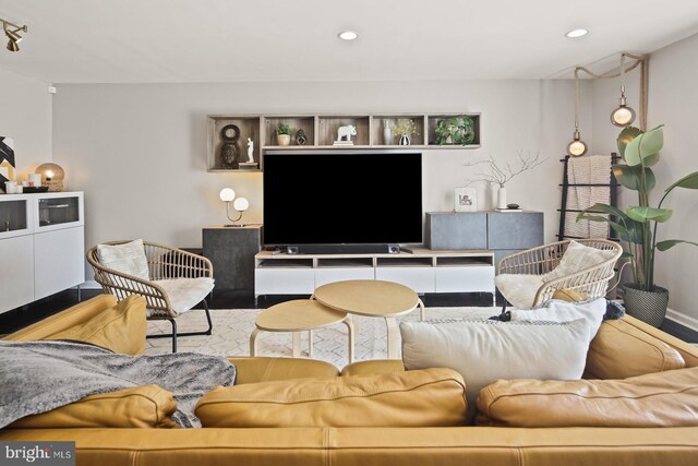 living area featuring recessed lighting