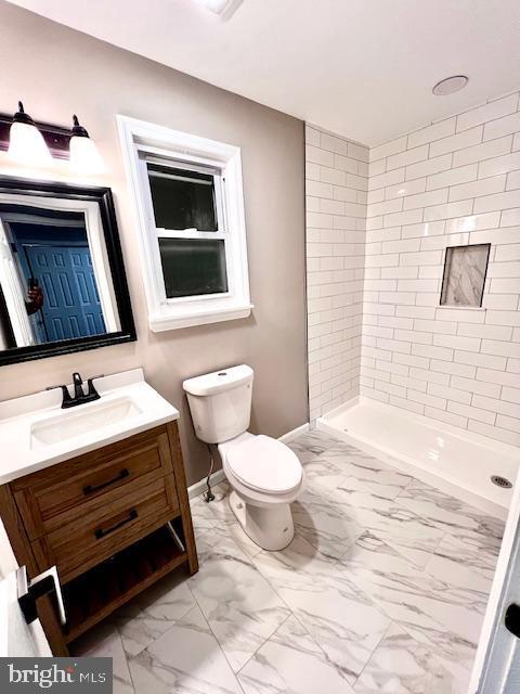218 Cooper St, Beverly, NJ 08010 - full bath featuring a shower stall, vanity, baseboards, toilet, and marble finish floor