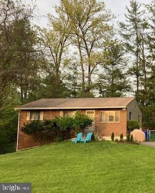 13211 Lutes Dr, Silver Spring, MD 20906 - view of front of property with a front lawn and brick siding