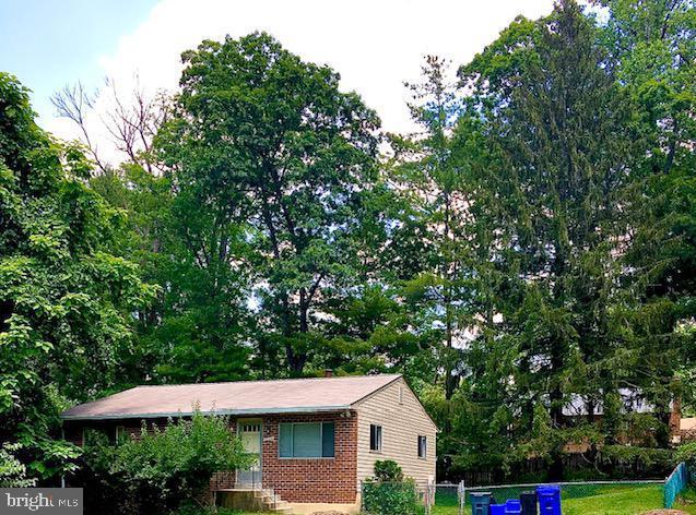13211 Lutes Dr, Silver Spring, MD 20906 - view of front facade featuring brick siding