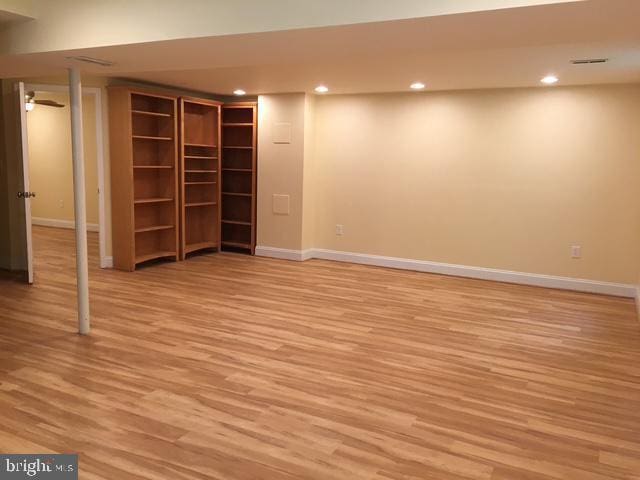 13211 Lutes Dr, Silver Spring, MD 20906 - finished below grade area with baseboards, light wood finished floors, and recessed lighting