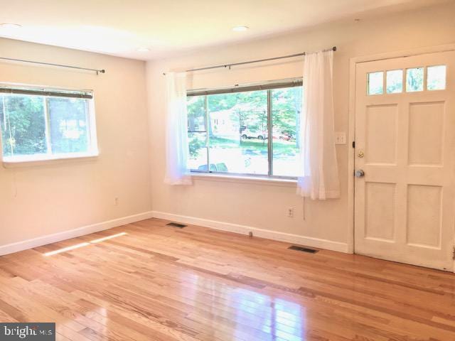 13211 Lutes Dr, Silver Spring, MD 20906 - foyer featuring plenty of natural light, baseboards, and recessed lighting