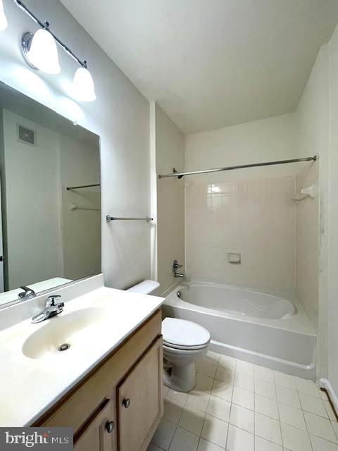 bathroom featuring tile patterned flooring, vanity, shower / bathtub combination, toilet, and visible vents