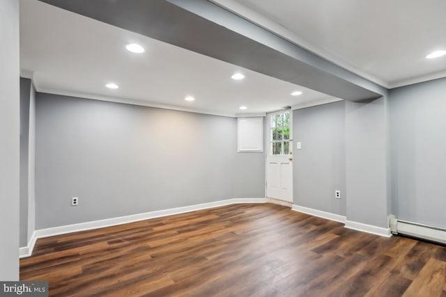 909 Old Lancaster Rd, Berwyn, PA 19312 - below grade area with wood finished floors, baseboards, recessed lighting, and a baseboard heating unit