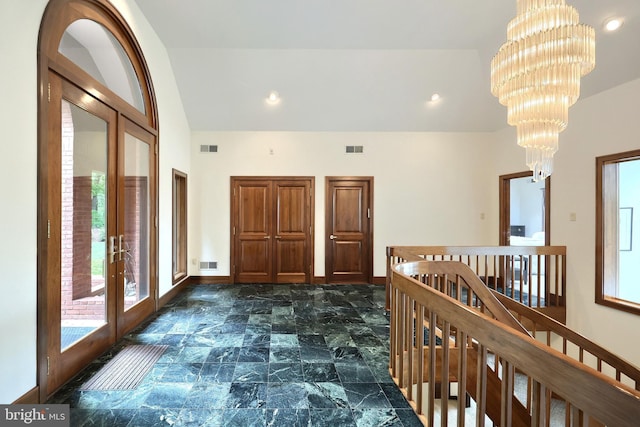 174 Springhouse Ln, Spring Grove, PA 17362 - hallway featuring an upstairs landing, a chandelier, french doors, vaulted ceiling, and baseboards