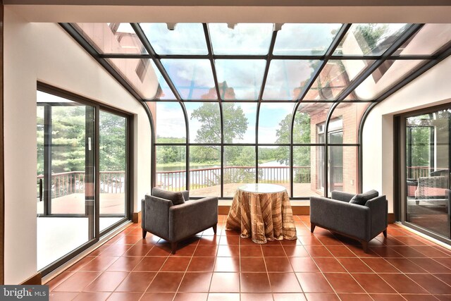 174 Springhouse Ln, Spring Grove, PA 17362 - sunroom / solarium with tile patterned flooring, plenty of natural light, a water view, and an outdoor hangout area