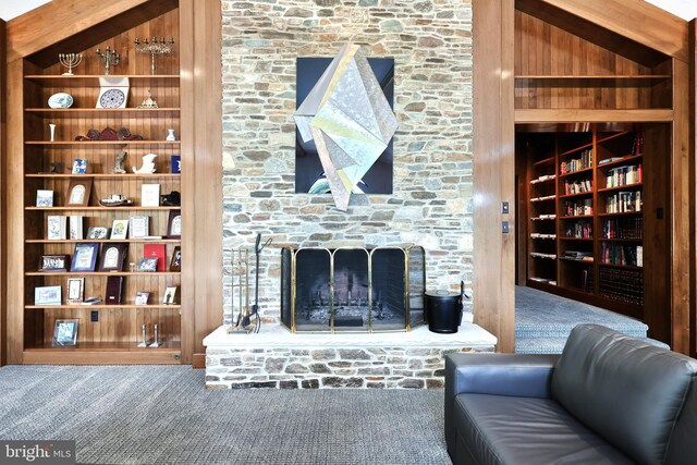 174 Springhouse Ln, Spring Grove, PA 17362 - carpeted living area with a fireplace and built in shelves