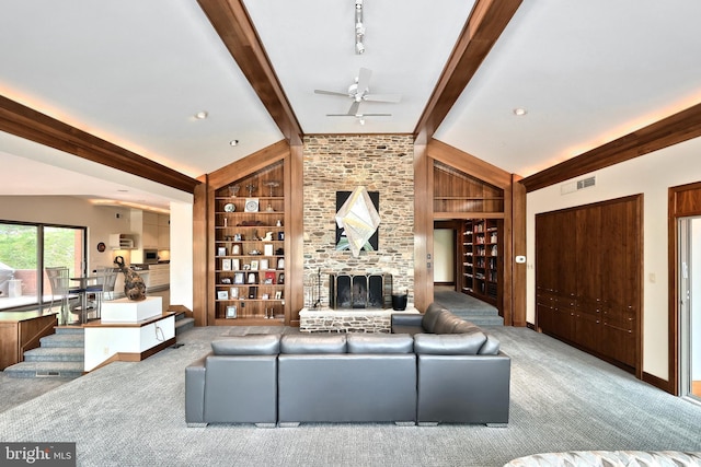 174 Springhouse Ln, Spring Grove, PA 17362 - carpeted living area featuring a ceiling fan, built in features, a brick fireplace, and baseboards