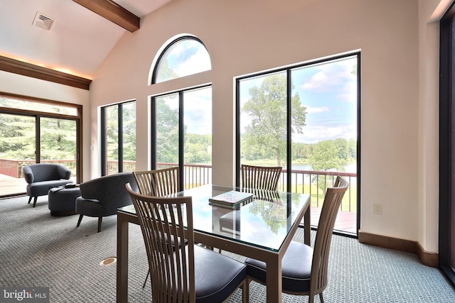 174 Springhouse Ln, Spring Grove, PA 17362 - dining area featuring light carpet, a water view, and baseboards