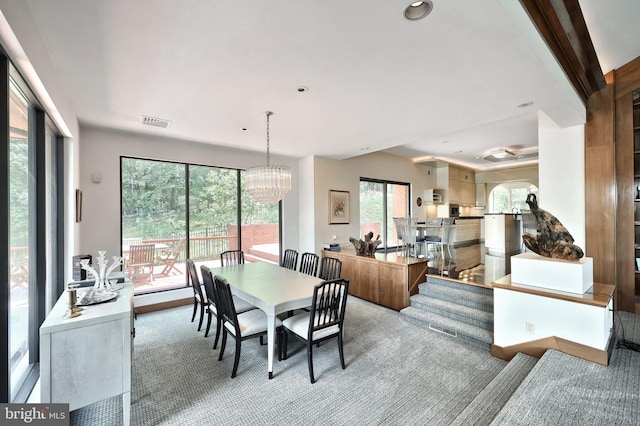 174 Springhouse Ln, Spring Grove, PA 17362 - carpeted dining space featuring a chandelier and recessed lighting